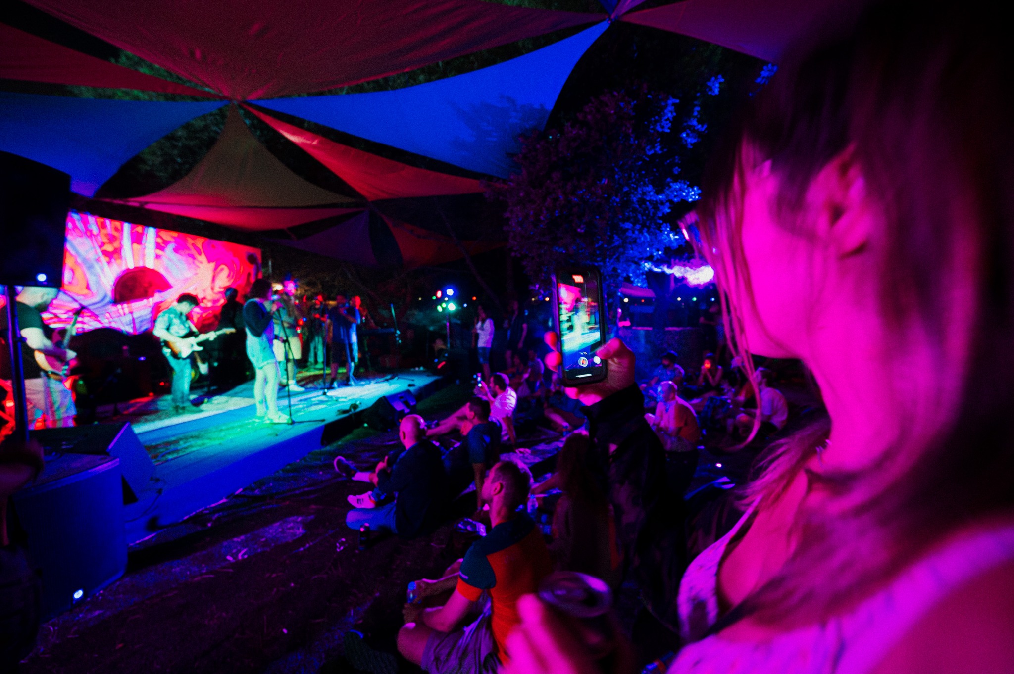 Crowd watching band at night festival