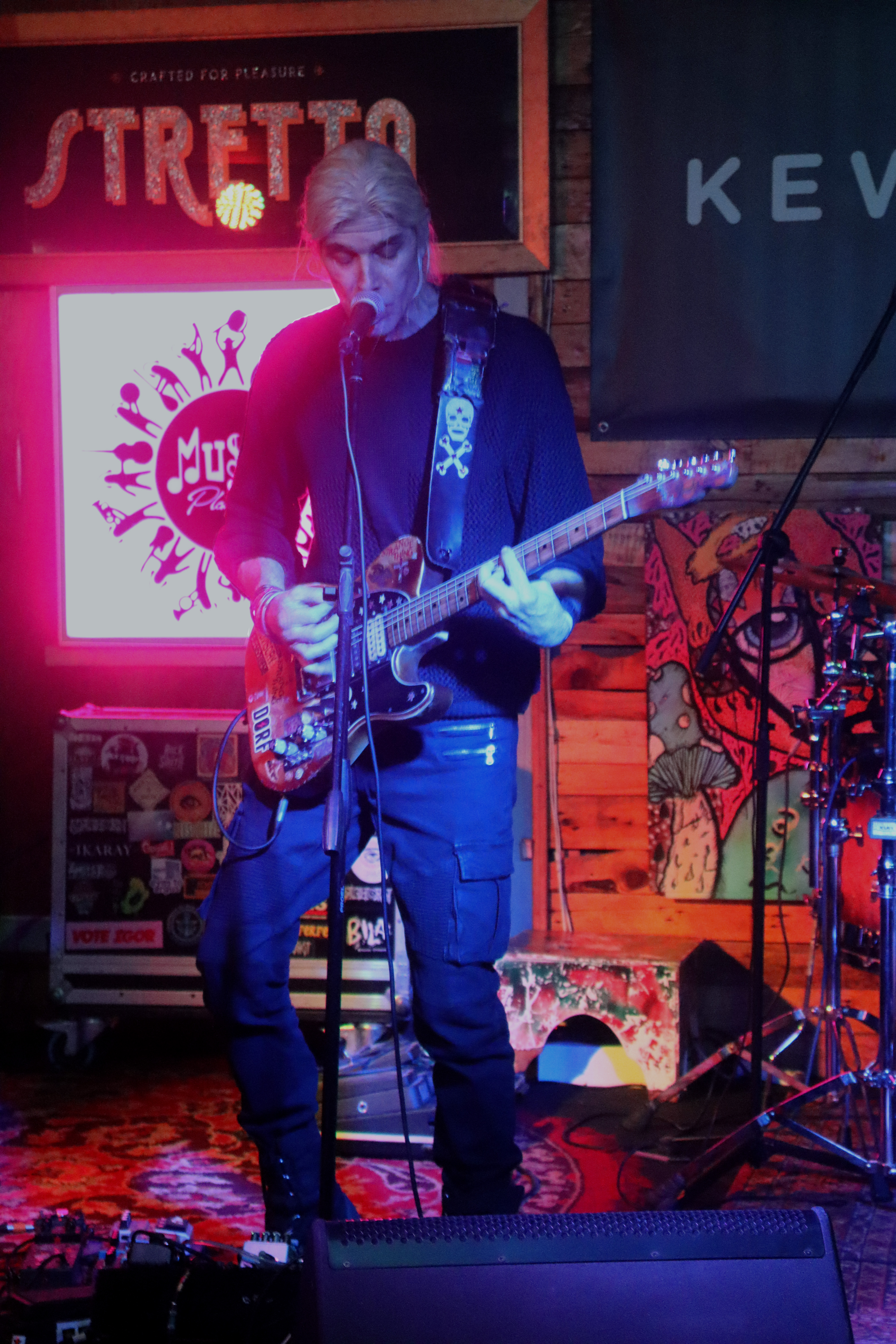 Guitarist on stage at venue