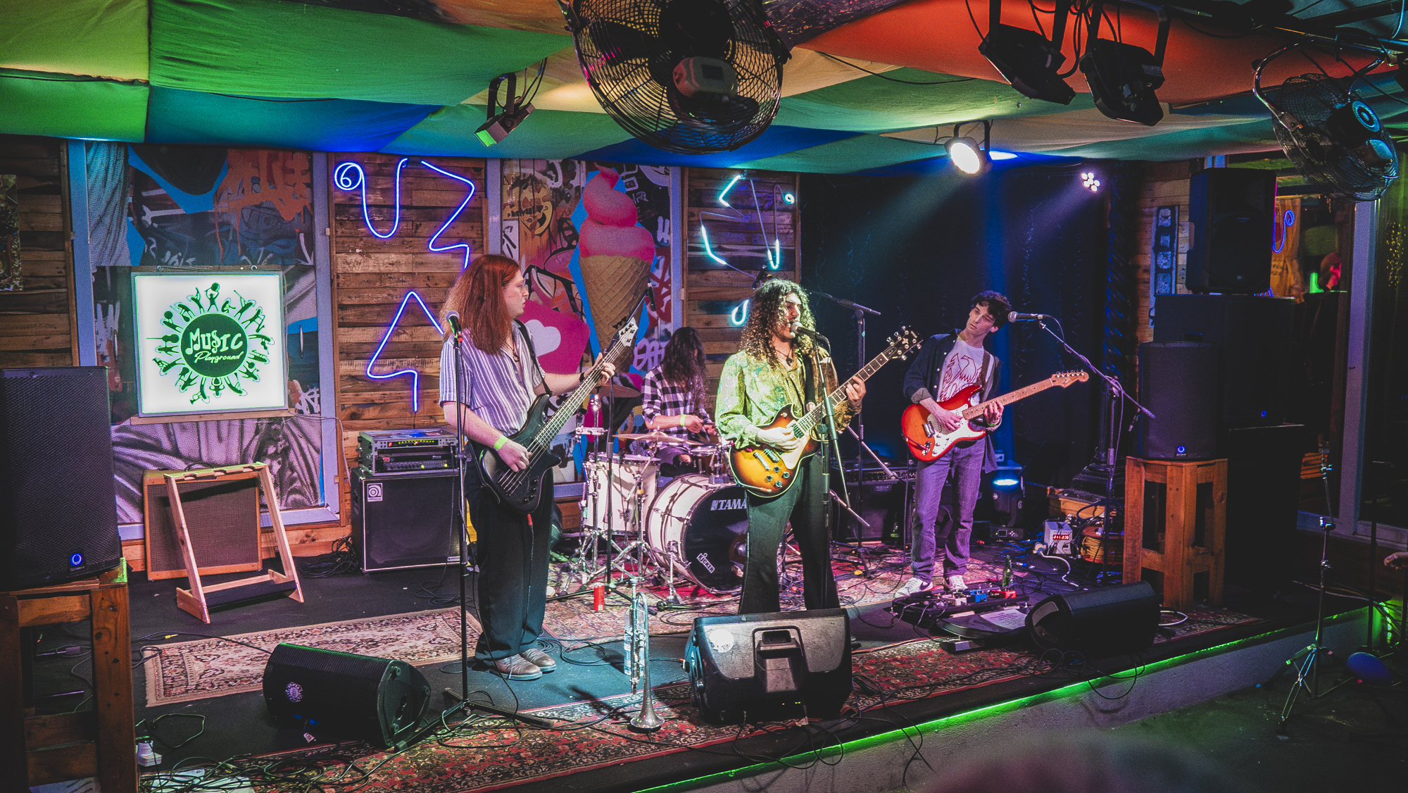 Band performing at indoor venue